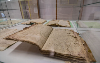 Image of a very old document displayed in a museum.